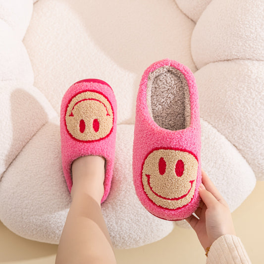 Pantuflas con cara sonriente de Melody