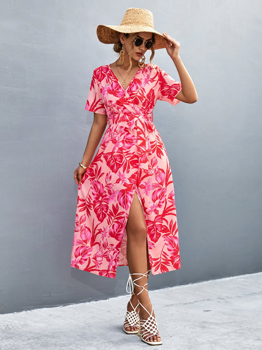 Vestido midi con escote cruzado, cintura anudada y estampado floral