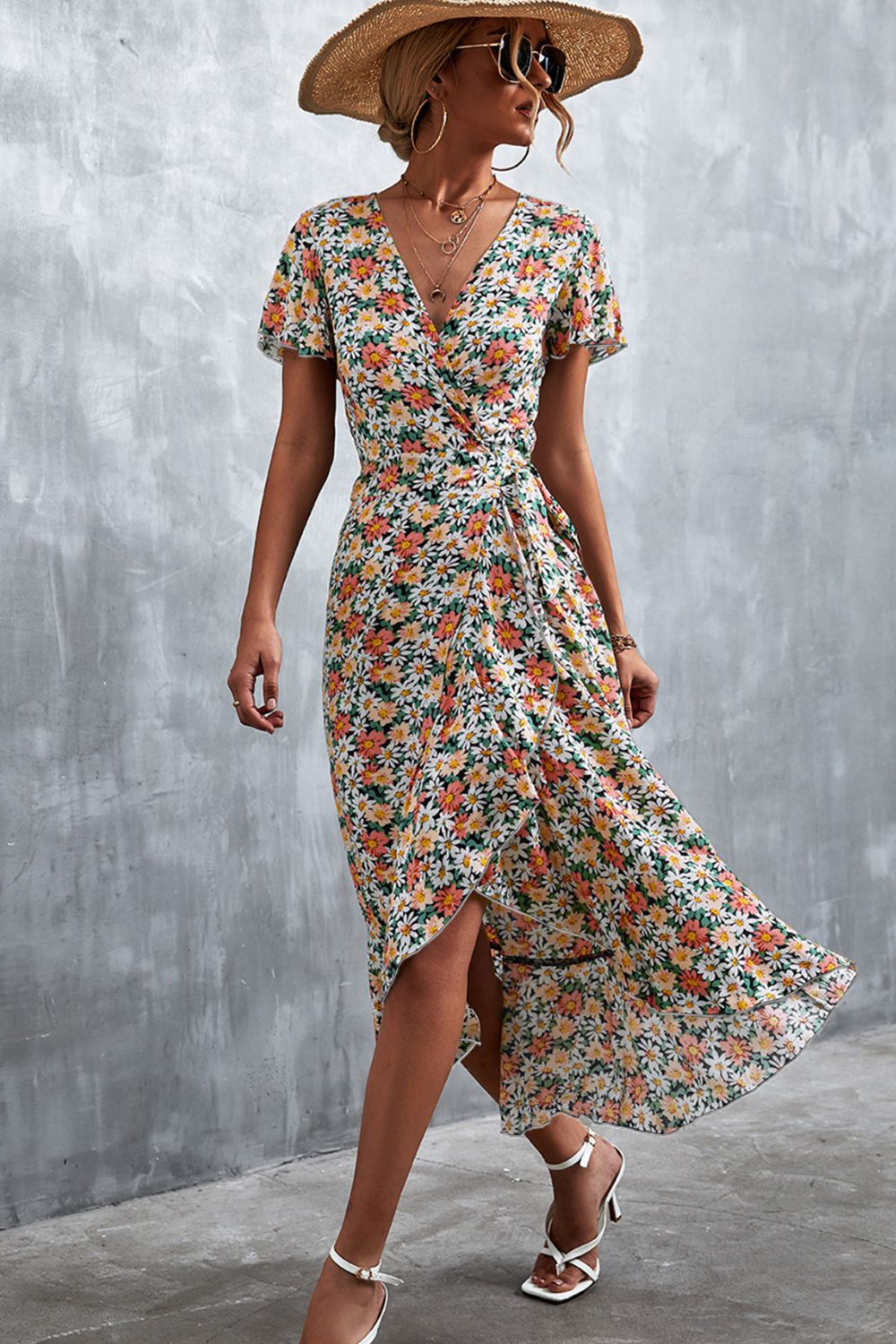 Vestido midi con cuello cruzado y estampado floral