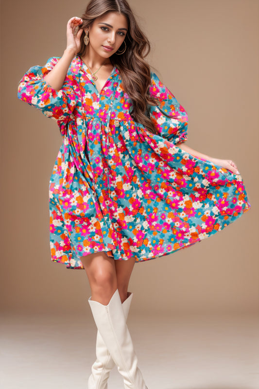 Vestido mini con mangas abullonadas y cuello con lazo floral