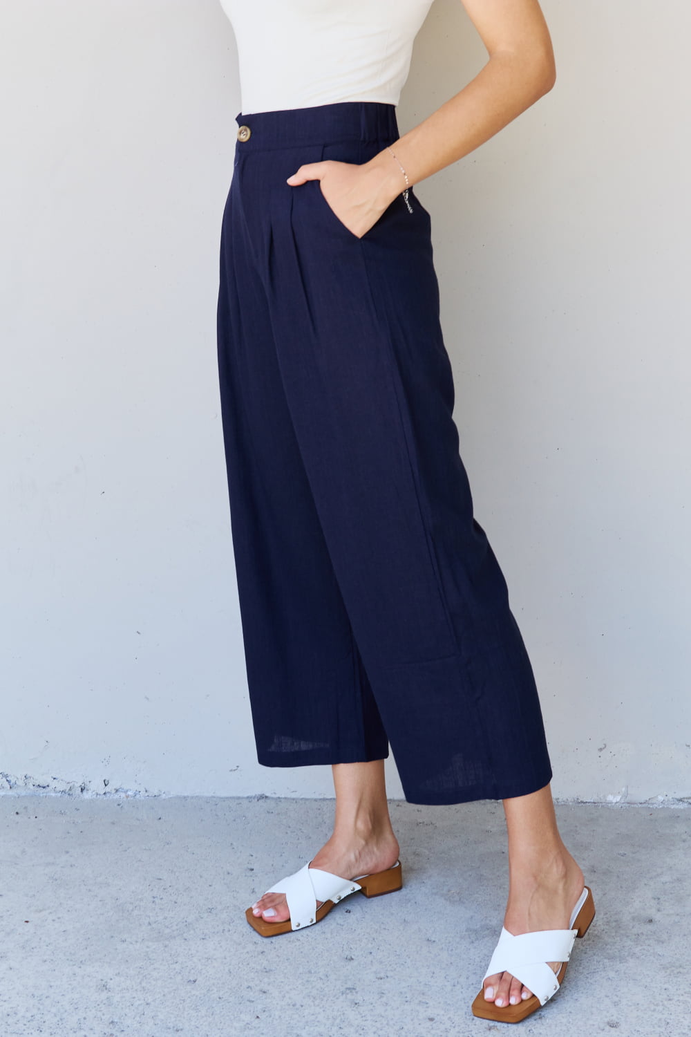 And The Why In The Mix Full Size Pleated Detail Linen Pants in Dark Navy - Runway Regalia