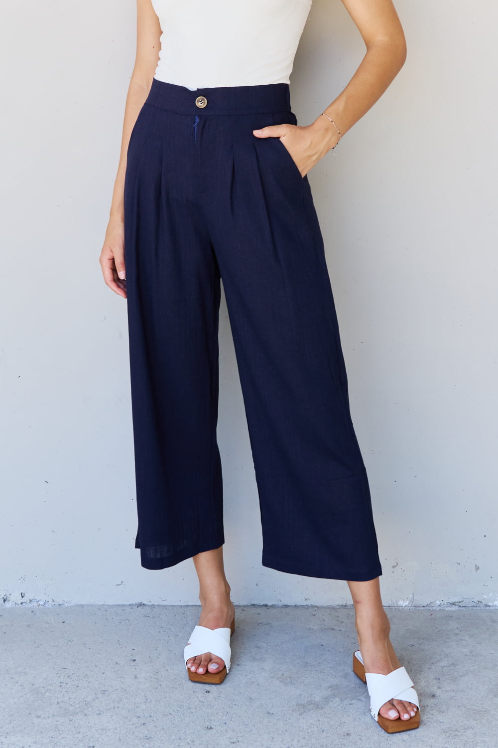 And The Why In The Mix Full Size Pleated Detail Linen Pants in Dark Navy - Runway Regalia