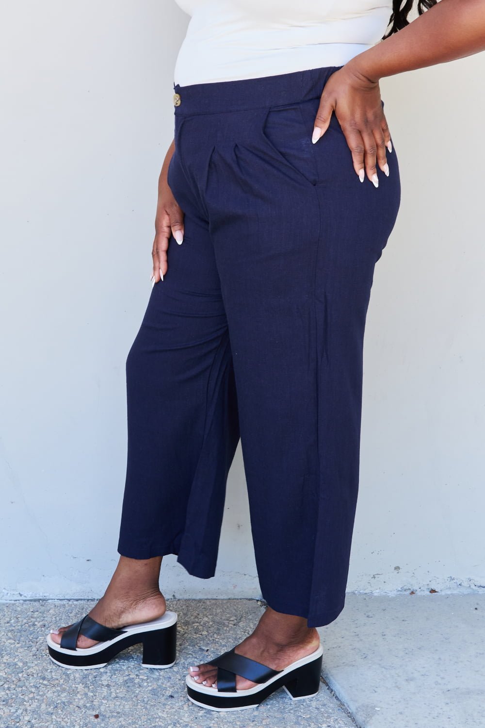 And The Why In The Mix Full Size Pleated Detail Linen Pants in Dark Navy - Runway Regalia