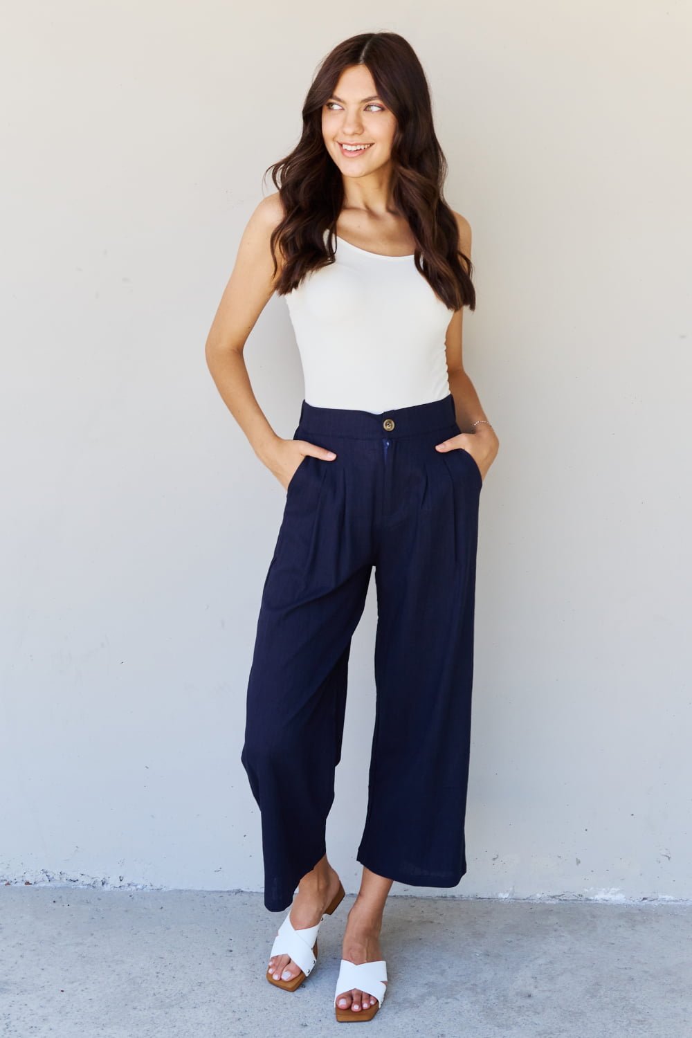 And The Why In The Mix Full Size Pleated Detail Linen Pants in Dark Navy - Runway Regalia