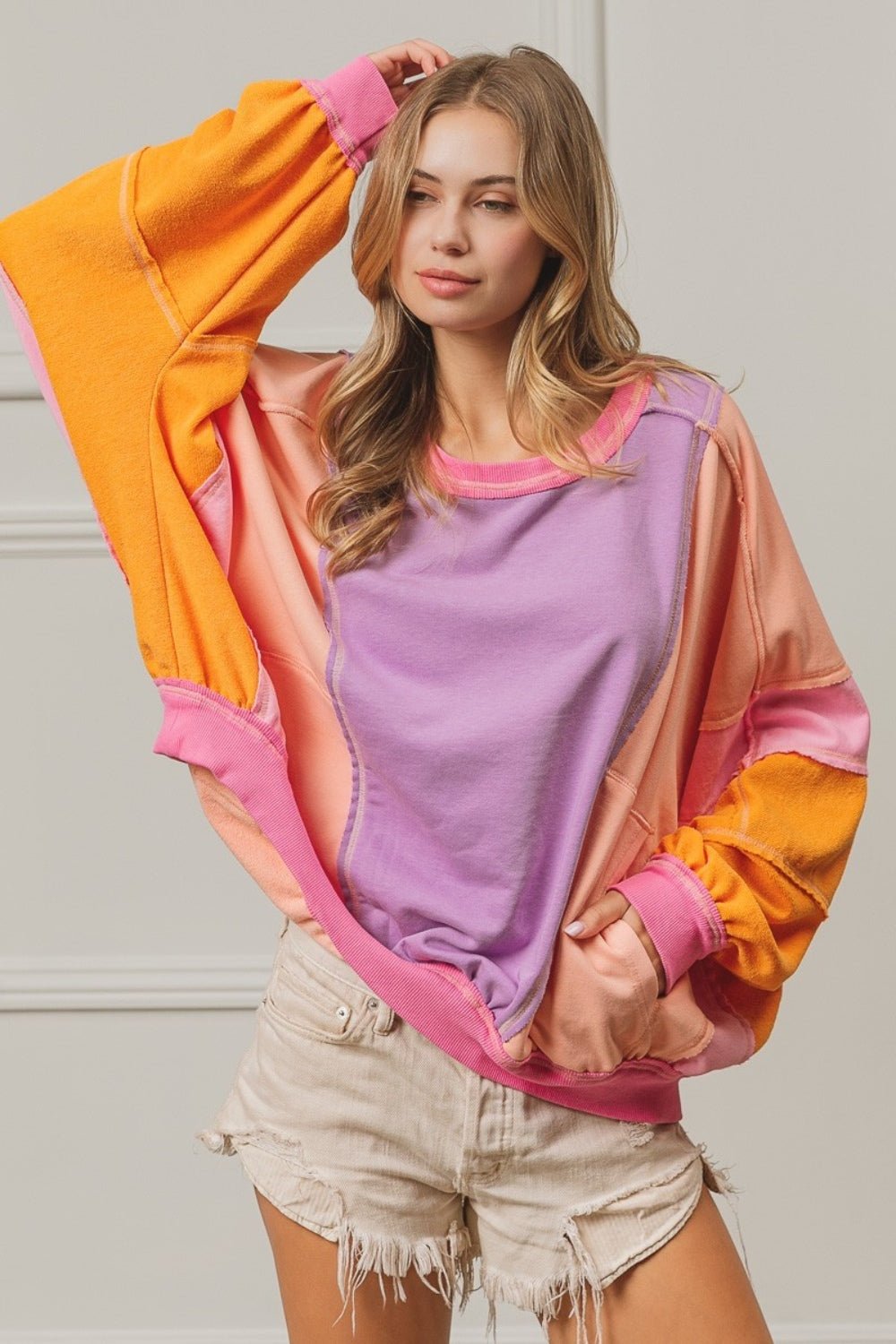 BiBi Color Block Exposed Seam Sweatshirt with Pockets - Runway Regalia