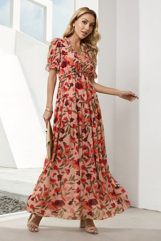 Vestido floral con escote en V y mangas cortas con volantes