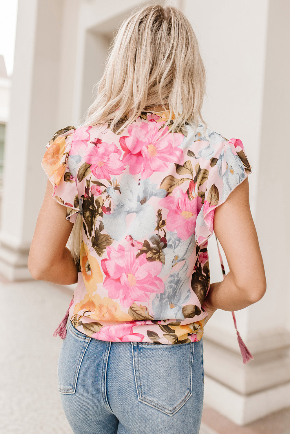 Blusa con mangas abullonadas y lazo